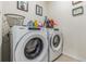 Laundry room with Whirlpool washer and dryer at 1839 Wild Rye Way, Kissimmee, FL 34744