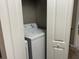 Laundry closet with washer and dryer at 2937 Banana Palm Dr, Kissimmee, FL 34747
