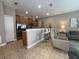 Modern kitchen with stainless steel appliances and breakfast bar at 2937 Banana Palm Dr, Kissimmee, FL 34747