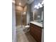 Clean bathroom, granite countertop, and shower at 2937 Banana Palm Dr, Kissimmee, FL 34747