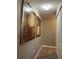 Hallway with carpet flooring and neutral wall colors at 2937 Banana Palm Dr, Kissimmee, FL 34747