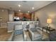 Modern kitchen with stainless steel appliances and breakfast bar at 2937 Banana Palm Dr, Kissimmee, FL 34747