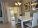Dining area with sliding door access to the backyard at 2937 Banana Palm Dr, Kissimmee, FL 34747