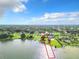 Aerial view of a lakefront property, highlighting the expansive lot and surrounding area at 33 S Ortman Dr, Orlando, FL 32805