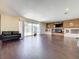 Spacious living room with a fireplace and dark hardwood floors at 33 S Ortman Dr, Orlando, FL 32805