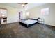 Bedroom with carpet and view of bathroom at 33 S Ortman Dr, Orlando, FL 32805
