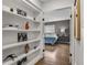 Hallway with built-in shelves and view of bedroom at 1500 E Harwood St, Orlando, FL 32803