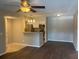 Open floor plan with kitchen and living area at 5164 Conroy Rd # 1514, Orlando, FL 32811