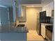 Modern kitchen featuring stainless steel appliances and granite countertops at 5164 Conroy Rd # 1514, Orlando, FL 32811