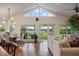 Spacious living room with hardwood floors, water views, and high ceilings at 301 Richard Pl, Orlando, FL 32806