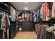 Large walk-in closet with ample shelving and hanging space at 301 Richard Pl, Orlando, FL 32806