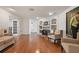 Bright living room with hardwood floors and a fireplace at 301 Richard Pl, Orlando, FL 32806