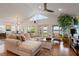 Bright living room with sectional sofa and access to backyard at 301 Richard Pl, Orlando, FL 32806