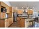 Modern kitchen with wood cabinets, stainless steel appliances at 301 Richard Pl, Orlando, FL 32806