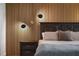 Close-up of bedroom wall with wood paneling and modern lighting at 301 Richard Pl, Orlando, FL 32806