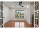 Spacious bedroom with hardwood floors and large window at 301 Richard Pl, Orlando, FL 32806
