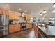 Modern kitchen with stainless steel appliances and island at 301 Richard Pl, Orlando, FL 32806