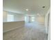 Spacious loft area with carpeted floor, recessed lighting, and multiple windows at 4379 Sagefield Dr, St Cloud, FL 34773