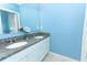 Stylish bathroom with double sinks and granite countertop at 1186 August Sky Dr, Deltona, FL 32738