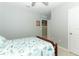 Light and airy bedroom with a full-size bed and adjacent doorway at 1186 August Sky Dr, Deltona, FL 32738