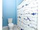 Clean bathroom with a toilet and shower/tub combo at 1186 August Sky Dr, Deltona, FL 32738