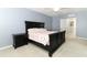 Spacious Primary bedroom with a king-size bed and ensuite bathroom at 1186 August Sky Dr, Deltona, FL 32738
