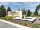 Courtland Park entrance features a stone fountain and wooden signage at 1186 August Sky Dr, Deltona, FL 32738