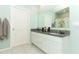 Modern bathroom with double vanity and granite countertop at 1186 August Sky Dr, Deltona, FL 32738