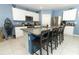 Modern kitchen with granite countertops, stainless steel appliances, and an island at 1186 August Sky Dr, Deltona, FL 32738