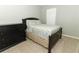 Bedroom with a double bed and dark brown dresser at 1186 August Sky Dr, Deltona, FL 32738