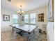 Game room with ping pong table and lake views at 3365 Puxton Dr, Orlando, FL 32824