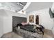 Main bedroom with plush upholstered bed and city view at 155 S Court Ave # 2208, Orlando, FL 32801