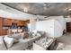 Open concept living area with a sectional sofa and kitchen at 155 S Court Ave # 2208, Orlando, FL 32801