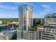 High-rise building with a rooftop pool and city views at 155 S Court Ave # 2208, Orlando, FL 32801