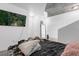 Comfortable bedroom with a large bed and city views at 155 S Court Ave # 2208, Orlando, FL 32801