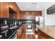 Modern kitchen with stainless steel appliances and granite countertops at 155 S Court Ave # 2208, Orlando, FL 32801