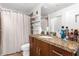 Updated bathroom with granite countertop and a shower at 155 S Court Ave # 2208, Orlando, FL 32801