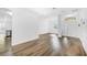 Bright and airy living room with wood-look floors at 3404 Great Pond Dr, Kissimmee, FL 34746