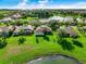 Community overview featuring lakefront properties and lush landscaping at 3404 Great Pond Dr, Kissimmee, FL 34746