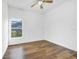 Bright bedroom with vinyl plank flooring and ceiling fan at 3404 Great Pond Dr, Kissimmee, FL 34746