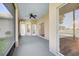 Screened porch with access to the backyard at 3404 Great Pond Dr, Kissimmee, FL 34746