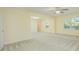 Large bedroom with ceiling fan and access to another room at 14166 Dove Hollow Dr, Orlando, FL 32824