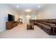 Finished basement with sectional sofa and entertainment center at 8841 Rhodes St, Kissimmee, FL 34747