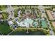 Aerial view of community amenities including pool, tennis, and lake at 8841 Rhodes St, Kissimmee, FL 34747