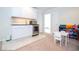 Basement recreation area with a kitchenette and furniture at 8841 Rhodes St, Kissimmee, FL 34747