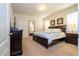 Spacious main bedroom with large bed and plenty of natural light at 8841 Rhodes St, Kissimmee, FL 34747