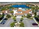 Spanish-style clubhouse with lakefront views and ample parking at 8841 Rhodes St, Kissimmee, FL 34747