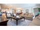 Bright and airy living room featuring neutral decor and ample seating at 8841 Rhodes St, Kissimmee, FL 34747