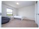 Light and airy bedroom with a twin bed and beanbag chair at 8841 Rhodes St, Kissimmee, FL 34747