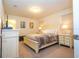 Comfortable guest bedroom with a queen-size bed and nightstands at 8841 Rhodes St, Kissimmee, FL 34747